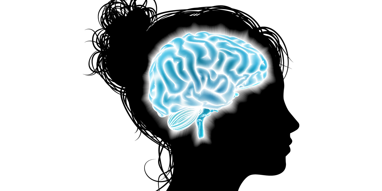 Silhouette of a woman’s head with a glowing brain. Concept for Theory of Mind psychotherapy, brain development, learning and mental stimulation.